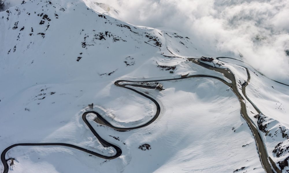 Aerial,View,Of,Grossgloknershtrasse,In,Snow.,Great,High,Mountain,Road