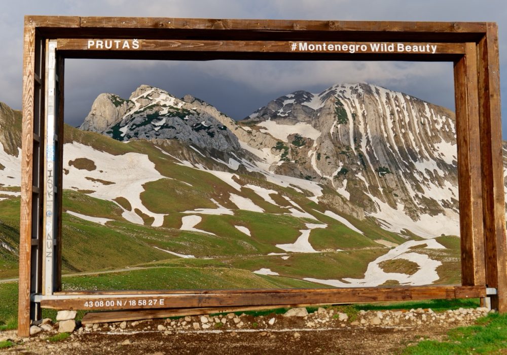 Sunset view of Prutas mountain in Durmitor National Park in Montenegro. Snow remains on the mountain. Famous hiking destination. Unesco world heritage site.